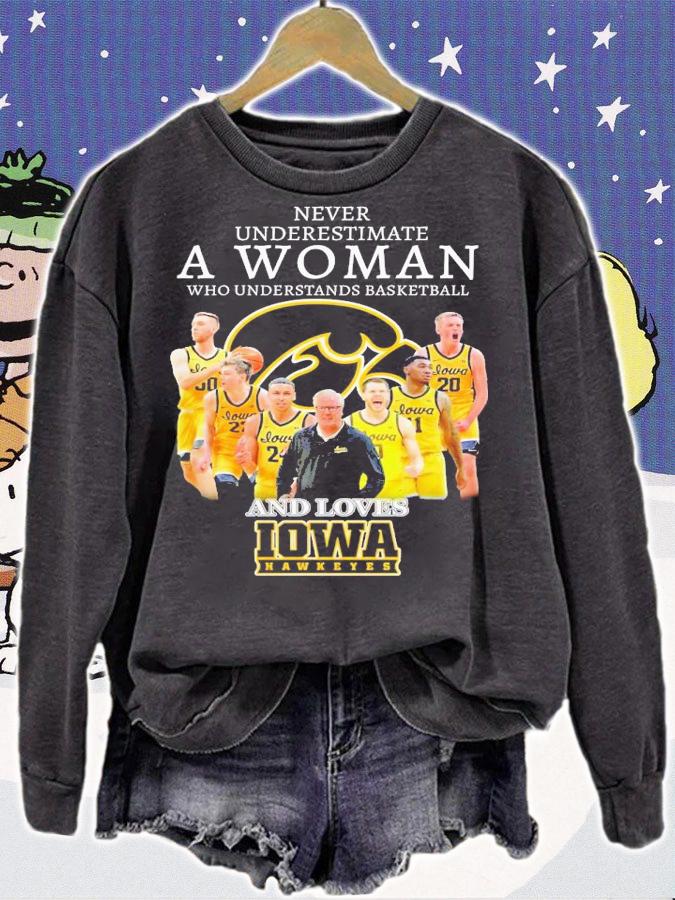 Never underestimate a woman who understands basketball and loves Iowa Hawkeyes shirt t-shirt sweatshirt